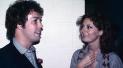 Source-feed image associated with Susan Sarandon leads tributes to Rocky Horror Picture Show co-star Tim Curry