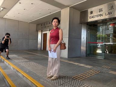 Source-feed image associated with Hong Kong court convicts Wall Street Journal publisher of deterring reporter from taking union role