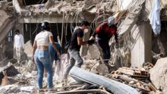 Source-feed image associated with 'Every person saved is a miracle': Families call to trapped loved ones in region devastated by Venezuela quakes