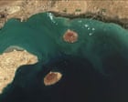 Source-feed image associated with US strikes Iranian launchers on Larak island amid strait of Hormuz tensions