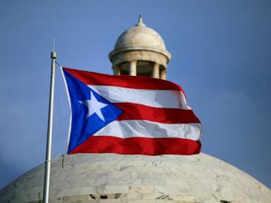 Source-feed image associated with Puerto Rico roiled by widening political crisis as top official comes under fire