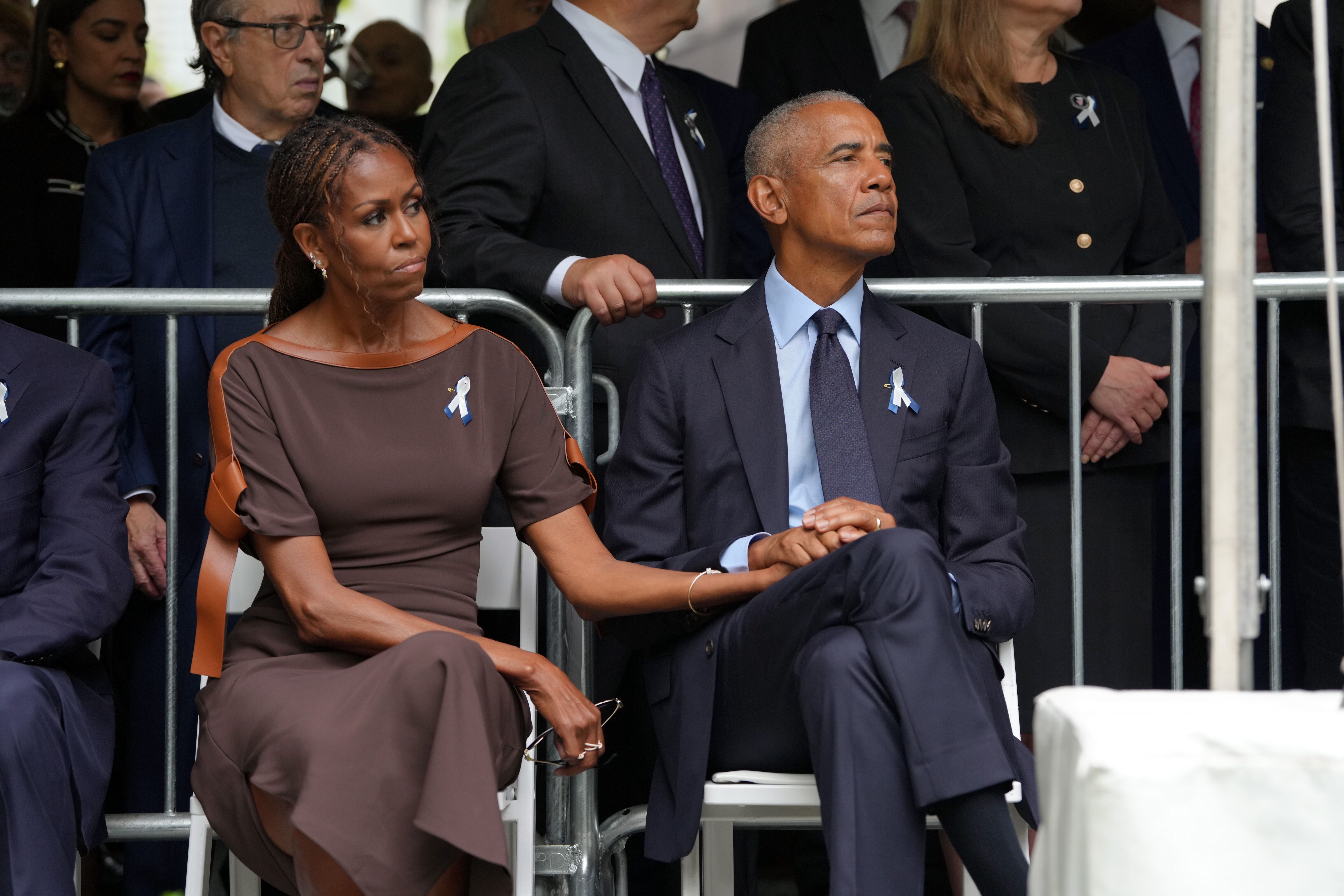 Source-feed image associated with From Melania to Michelle: The 9/11 Memorial Ceremonies and Somber FLOTUS Fashion