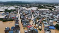 Source-feed image associated with 'The water just came so fast': Typhoon triggers floods and rare tornadoes in China