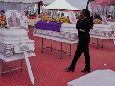 Source-feed image associated with Kenya holds a memorial service for 16 victims of last month's girls school fire