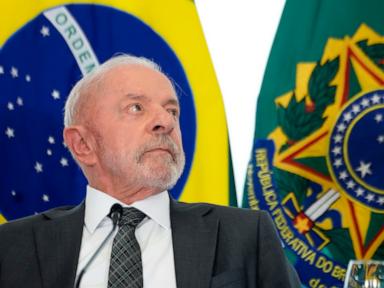 Source-feed image associated with Brazil's Lula signs measures to cut fuel taxes and subsidize diesel ahead of election