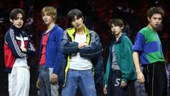 Source-feed image associated with 'Put your phone down': K-pop band weighs in on concert etiquette
