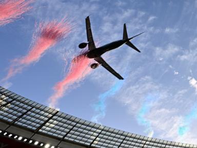 Source-feed image associated with Dramatic low flyby by passenger jets over South African stadium sparks safety debate