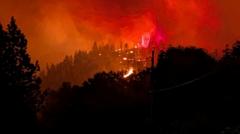 Source-feed image associated with Residents warned to brace for the worst as Canada wildfire rages out of control