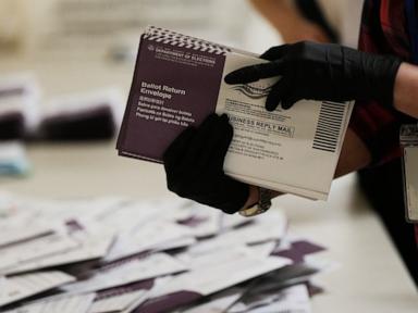 Source-feed image associated with Appeals court gives Trump temporary win in mail-in voting fight