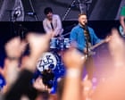 Source-feed image associated with Zach Bryan review – colossal US country star converts the UK to his inclusive take on the rodeo