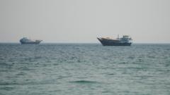 Source-feed image associated with US and Iran trade fire as tensions rise over Strait of Hormuz