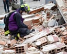 Source-feed image associated with Venezuela earthquake: father and son found alive in rubble after four days as death toll nears 1,500