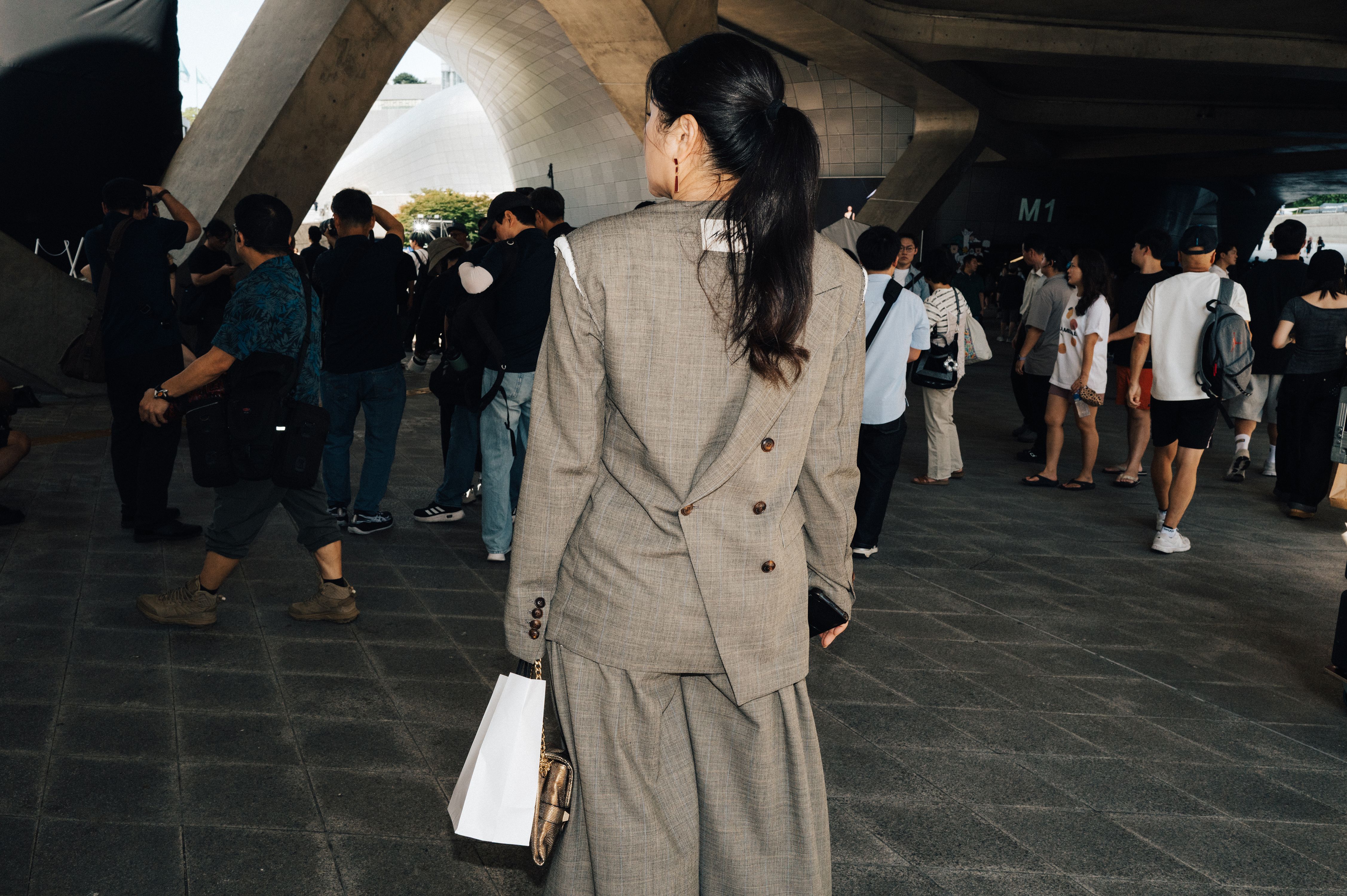 Source-feed image associated with The Best Street Style Photos From the Spring 2027 Shows in Seoul