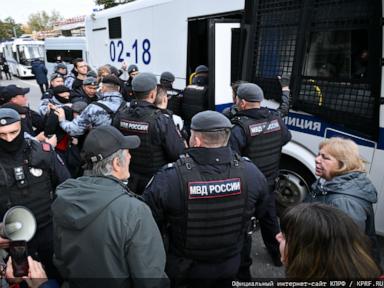 Image from linked report: Dozens detained at Kremlin-friendly Communist Party's Moscow rally, party says