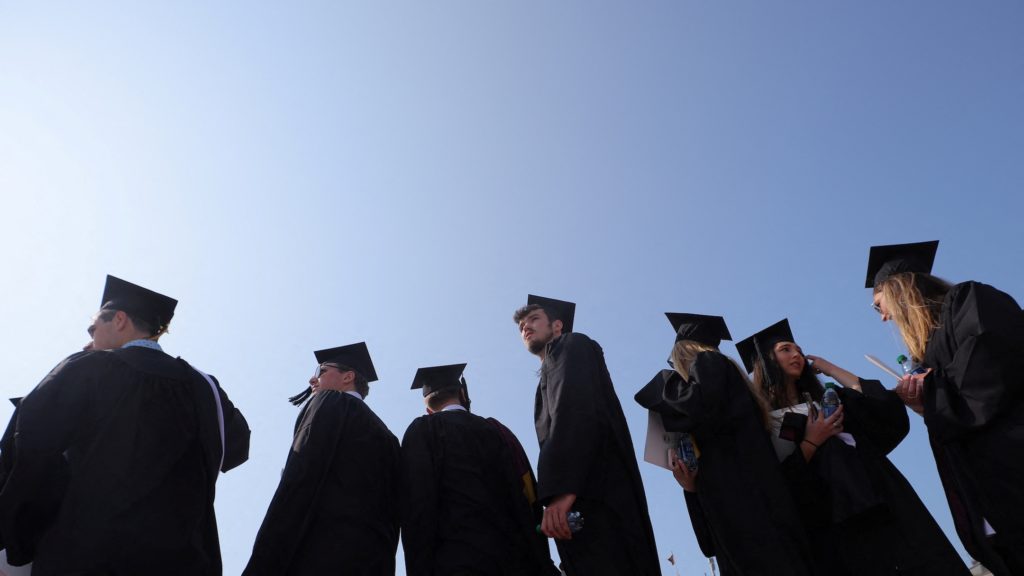 Source-feed image associated with College graduates begin their job search in a world being transformed by AI