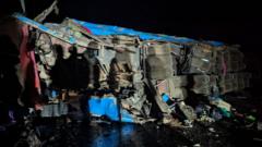Source-feed image associated with Uganda suspends school trips after 20 pupils die in bus crash