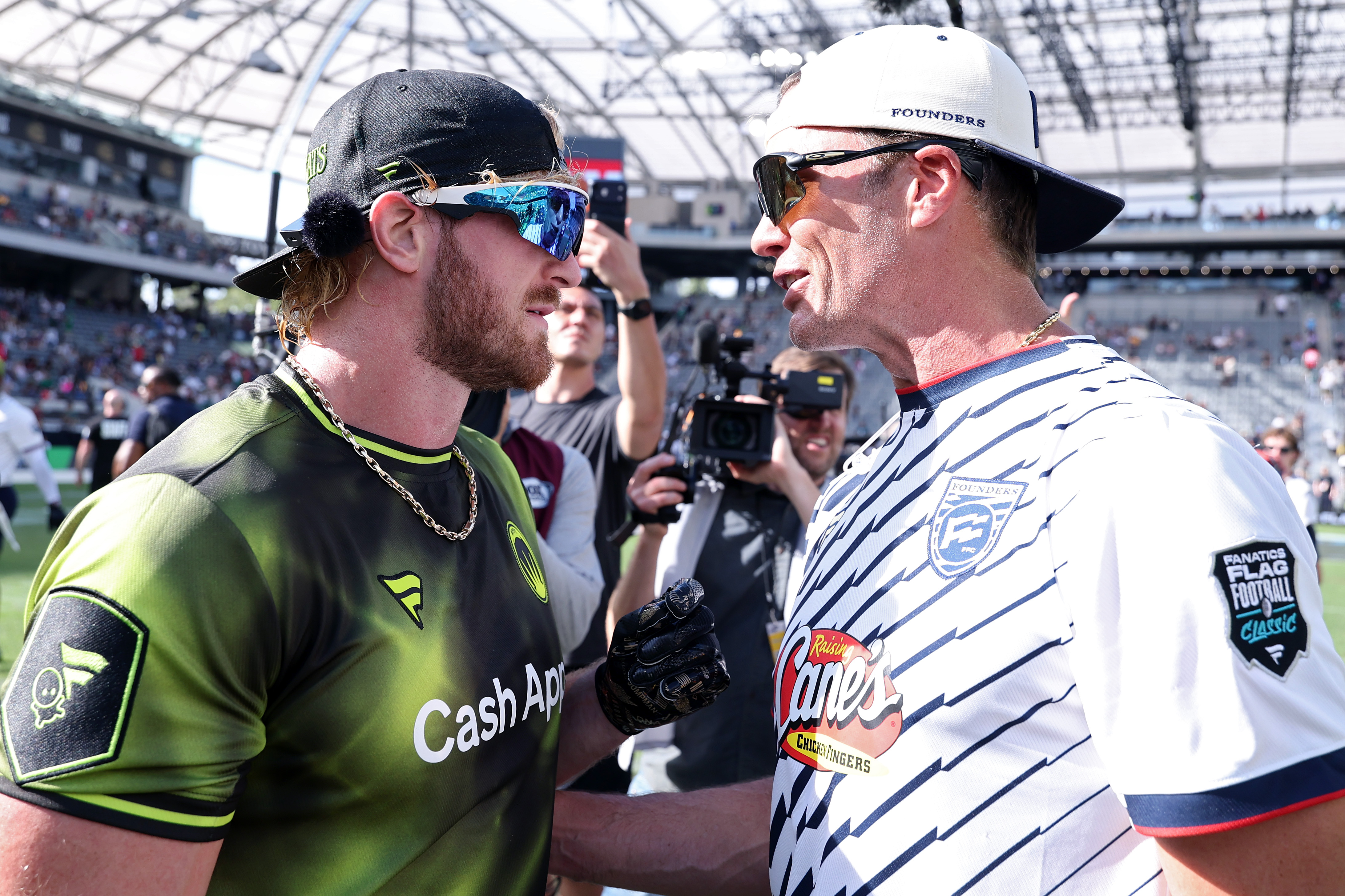 Source-feed image associated with Tom Brady Slaps Logan Paul at Fanatics Fest, Calls Him a ‘Dork’ and ‘Nerd’ on X