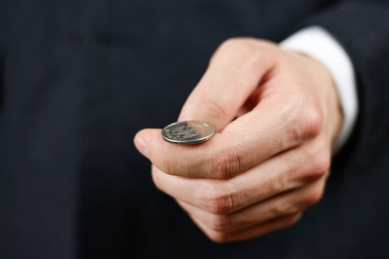 Source-feed image associated with Warren Buffett’s mentor said his wealth came down to luck. Is your life savings riding on a coin flip?
