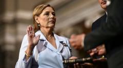 Source-feed image associated with Watch: Moment Darline Graham is sworn in to senate seat