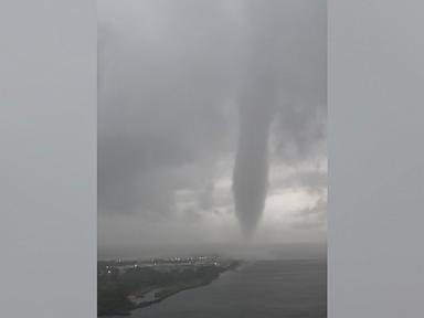 Source-feed image associated with Tornado, waterspout rip through Long Island, Queens