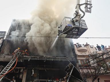 Source-feed image associated with Fire tears through building in northern India, killing 14, mostly students