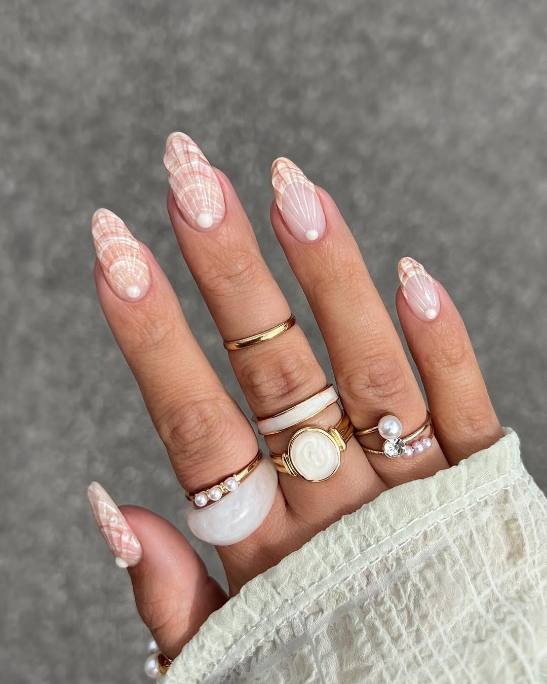 Source-feed image associated with Sea Shell Nails: All The Nautical Inspiration You Need