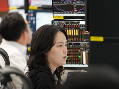 Source-feed image associated with Asian shares retreat as US stocks halt their record-breaking rally, while oil prices fall back