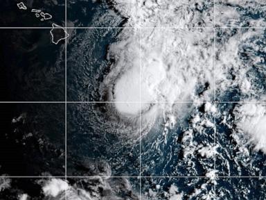 Source-feed image associated with Tropical Storm Moke to pass south of Hawaii, bringing heavy rain to the Big Island
