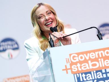 Source-feed image associated with Meloni celebrates her Italian government's longevity during party rally in Bari
