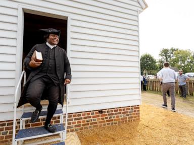 Image from linked report: Congregants celebrate the reconstruction of one of America's oldest Black churches