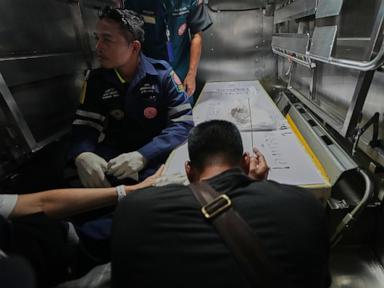Source-feed image associated with Death toll from a Bangkok music bar fire rises to 30, dozens remain in hospital