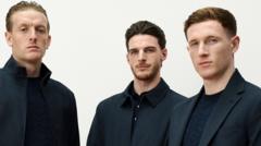 Source-feed image associated with 'It's very Bond': Fashion experts on the England squad's off-pitch look