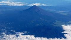 Source-feed image associated with Father leaves 7-year-old son alone on Mount Fuji to continue hike, reports say
