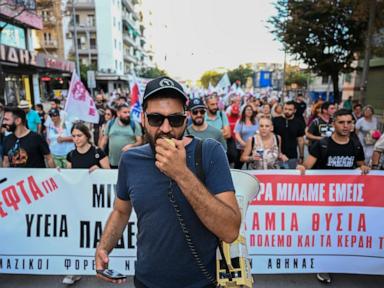 Source-feed image associated with Greeks promised tax relief, wage hikes as protesters take to the streets over cost of living crunch