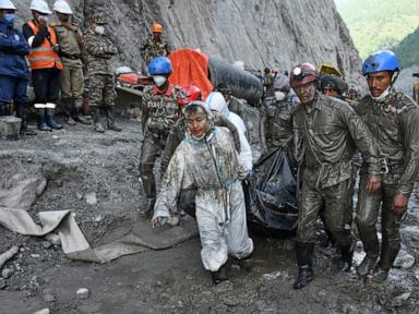 Source-feed image associated with Rescuers dig 4 bodies from a Nepal hydropower tunnel as families demand answers