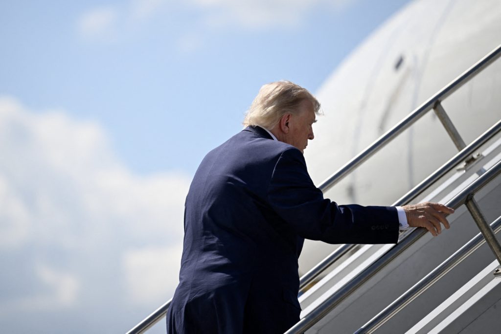 Source-feed image associated with Trump's threat to push ahead on settlement fund injects new uncertainty into attorney general talks