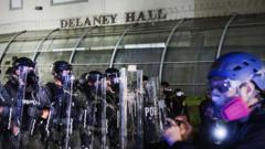 Source-feed image associated with New Jersey alleges 'unsanitary' conditions at migrant facility rocked by protests