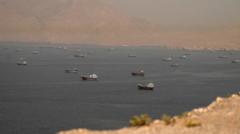 Source-feed image associated with US and Iran trade strikes after tankers hit in Strait of Hormuz