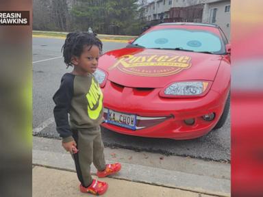 Image from linked report: WATCH: 8-year-old turns race car driving dream into reality