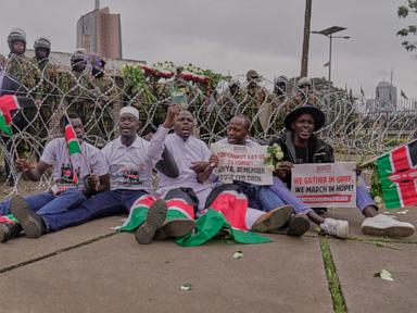 Source-feed image associated with Kenyan police block roads around the country's capital ahead of anti-government protest