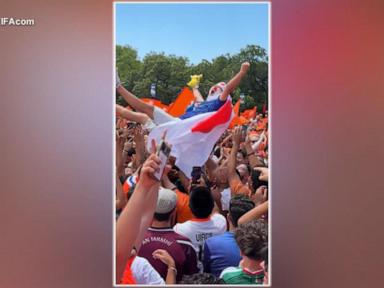Source-feed image associated with WATCH: Tourists light up World Cup across the US