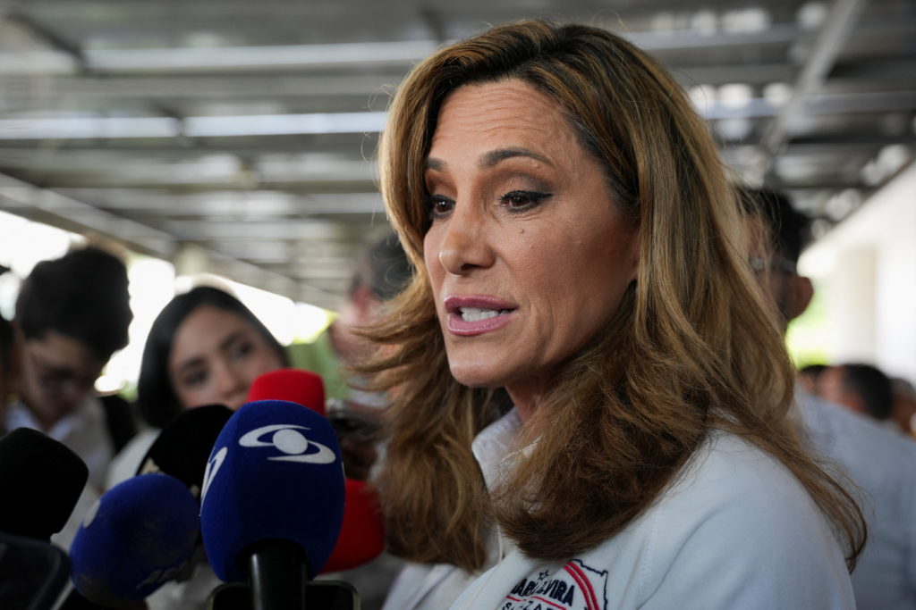 Source-feed image associated with Florida congresswoman running for reelection breaks with Trump on immigration