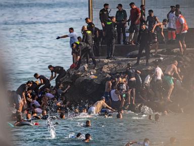 Source-feed image associated with Spain deploys military to Ceuta after thousands of people breach Morocco’s border and at least 9 die