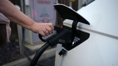 Source-feed image associated with UK electric car sales target set to be weakened