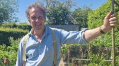 Source-feed image associated with Monty Don receives reminder from BBC over clothing promotion rules