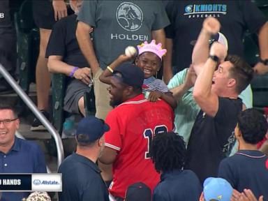 Image from linked report: WATCH: Birthday girl shows off her arm after catching home run at Braves game