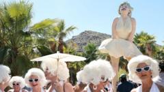 Source-feed image associated with Marilyn Monroe auction features star's make-up and gowns on 100th birthday