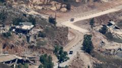 Source-feed image associated with Israel strikes southern Lebanon as Hezbollah condemns new deal