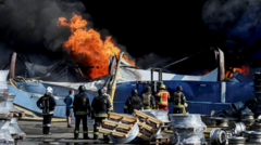 Source-feed image associated with At least 37 dead and hundreds evacuated after strike on Kyiv weapons depot