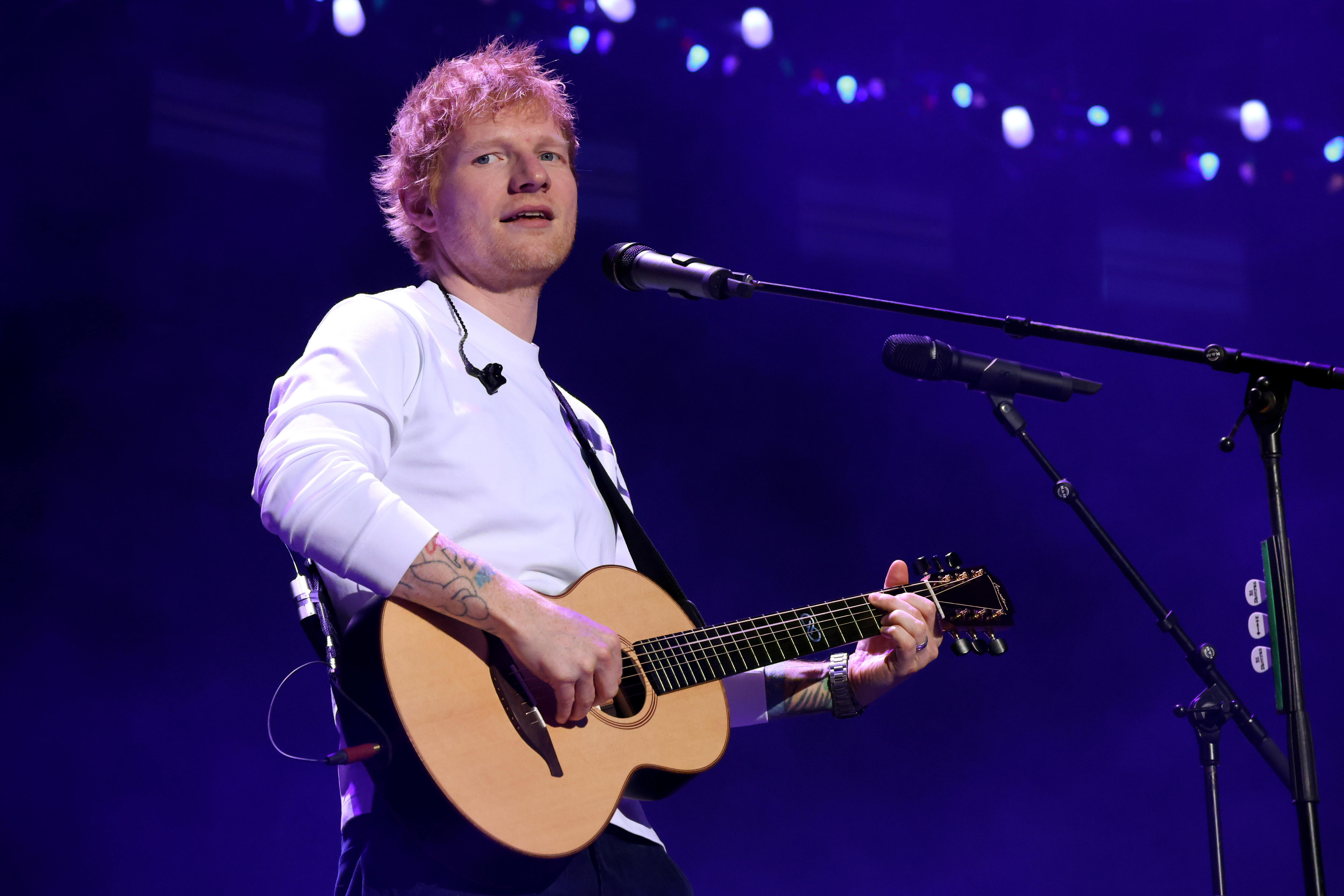 Image from linked report: Protestors March Outside Ed Sheeran Concert After Macklemore Was Dropped From Tour: ‘It’s Not Going to Stop Until Palestine is Free’